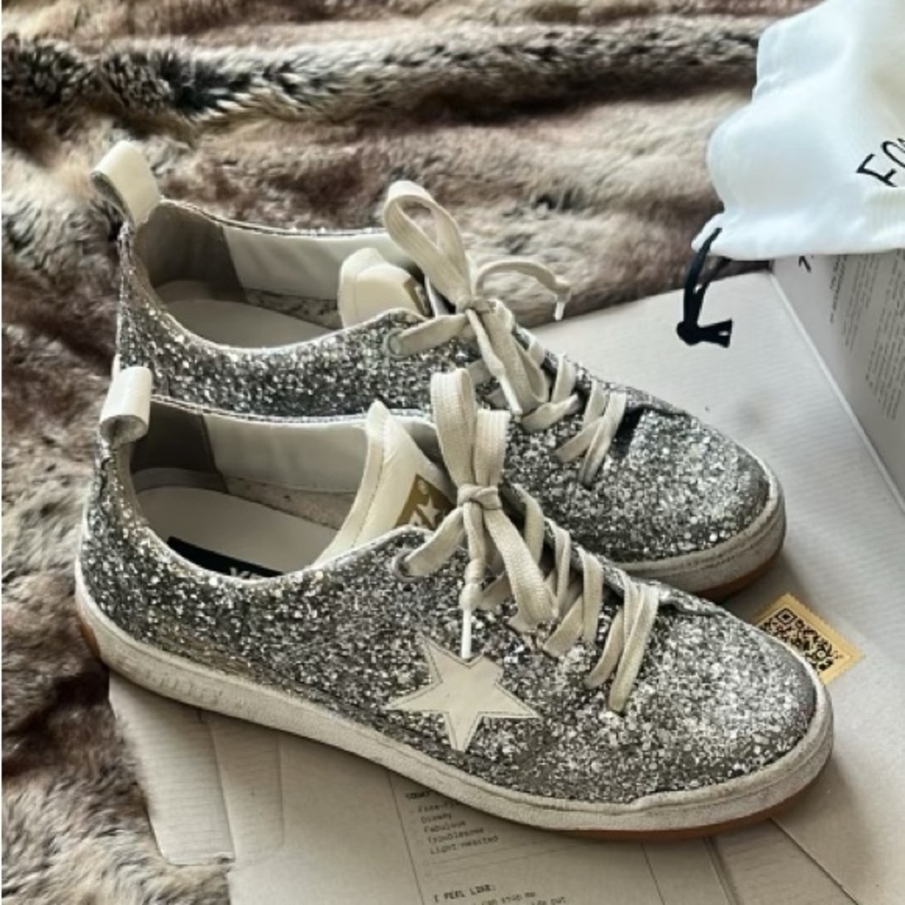 Gently worn woman’s size 39 (8.5) golden goose shoe